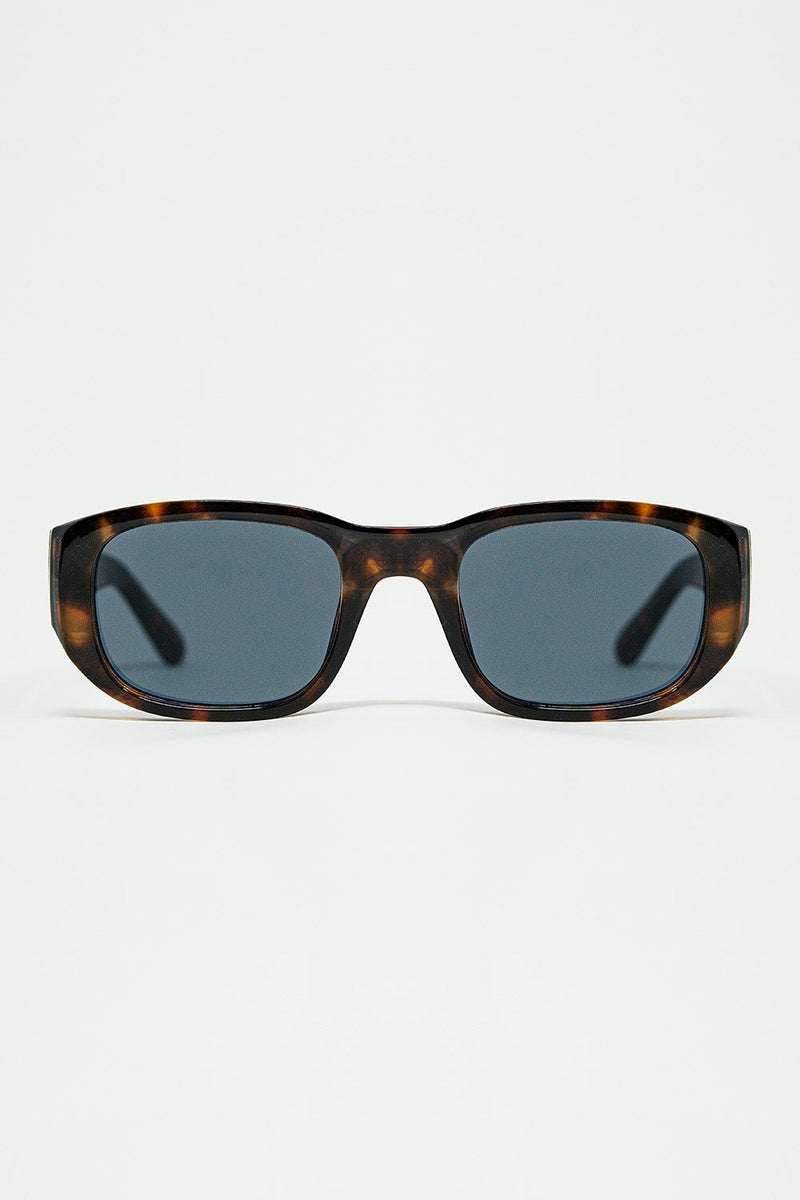 Oval Sunglasses With High Gloss Transparent Frames in Brown