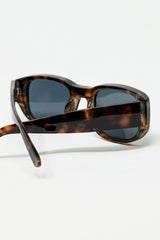 Oval Sunglasses With High Gloss Transparent Frames in Brown