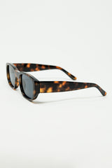 Oval Sunglasses With High Gloss Transparent Frames in Brown